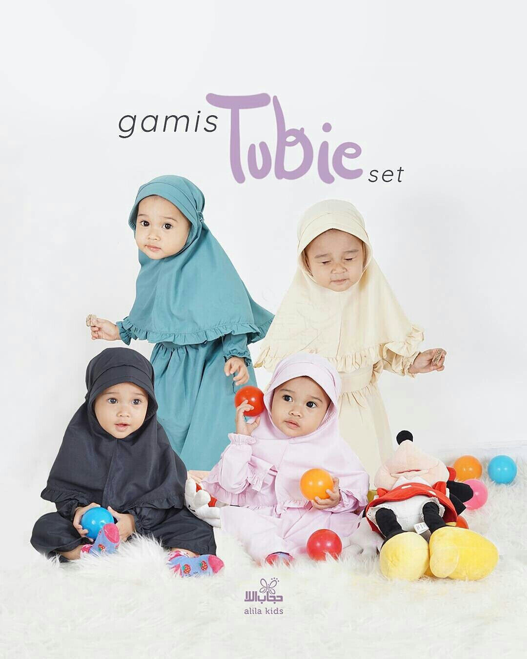 a group of people sitting on a snow covered ground